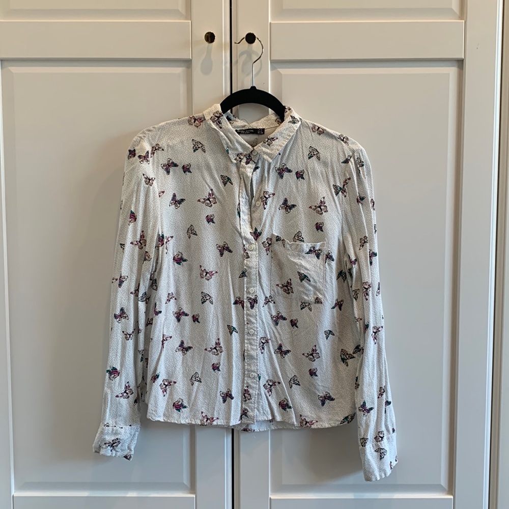 White button down with purple butterfly pattern